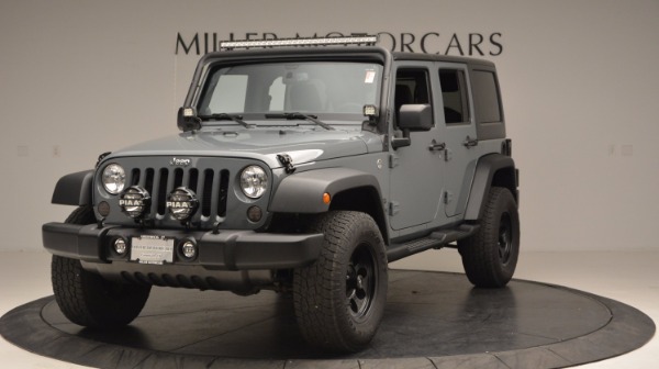 Used 2014 Jeep Wrangler Unlimited Sport for sale Sold at Rolls-Royce Motor Cars Greenwich in Greenwich CT 06830 1