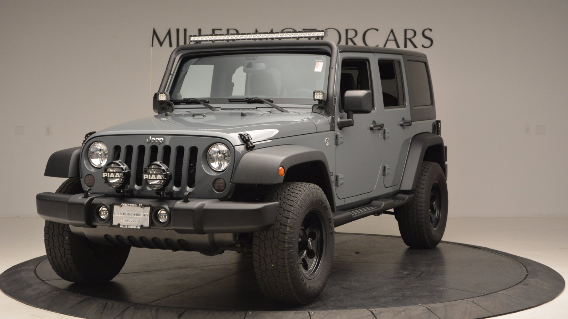 Used 2014 Jeep Wrangler Unlimited Sport for sale Sold at Rolls-Royce Motor Cars Greenwich in Greenwich CT 06830 1