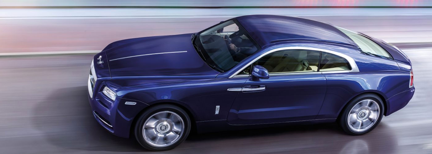 Rolls-Royce Wraith Purple Driving on street